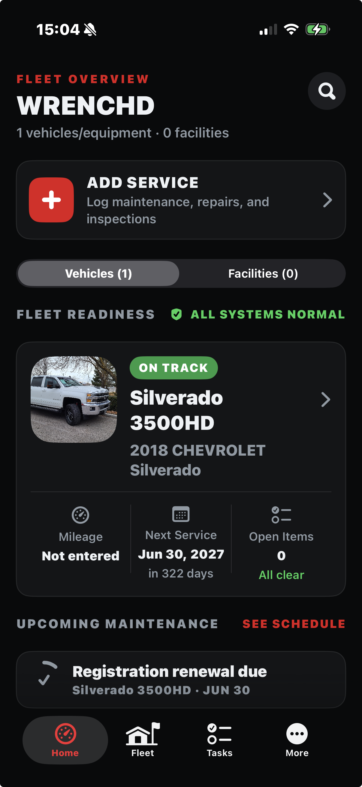 Wrenchd fleet overview showing a vehicle on track with mileage, next service date, and upcoming maintenance